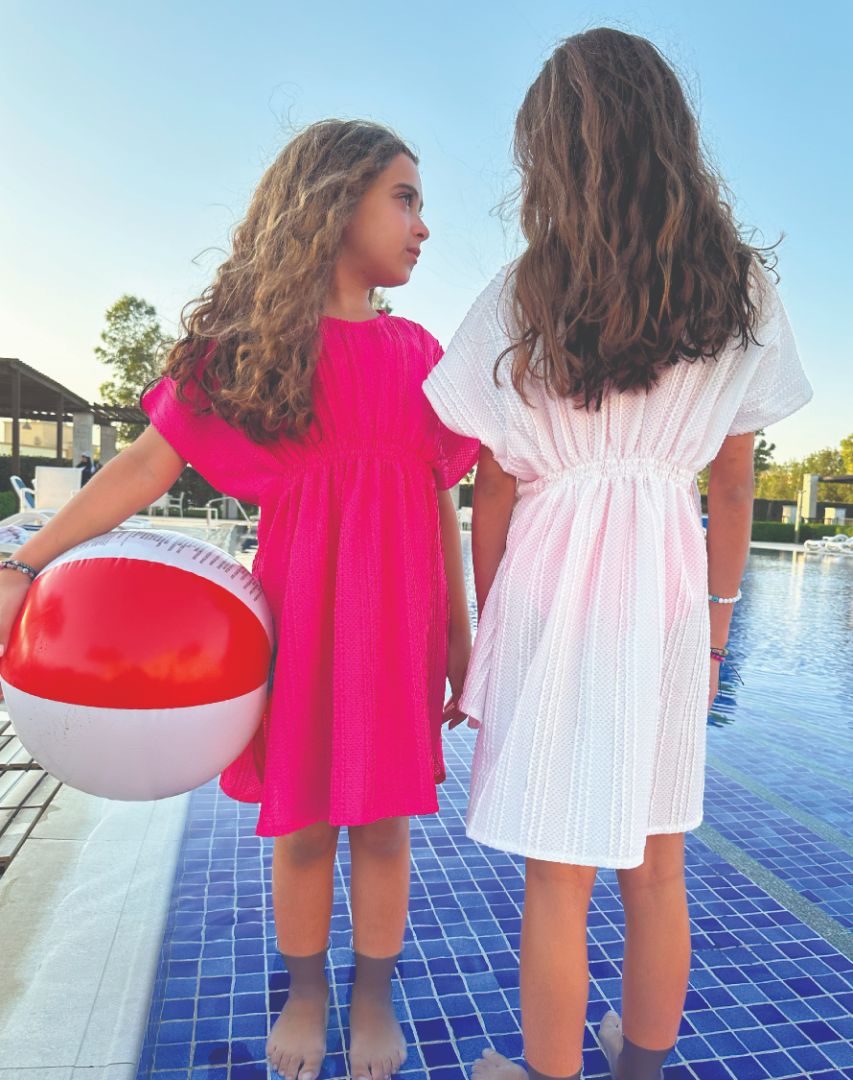 Beach coverup in textured fushia