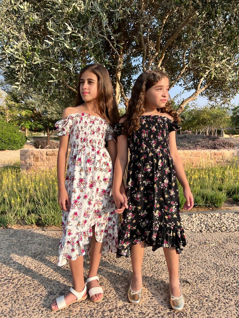 Floral smocked dress in white