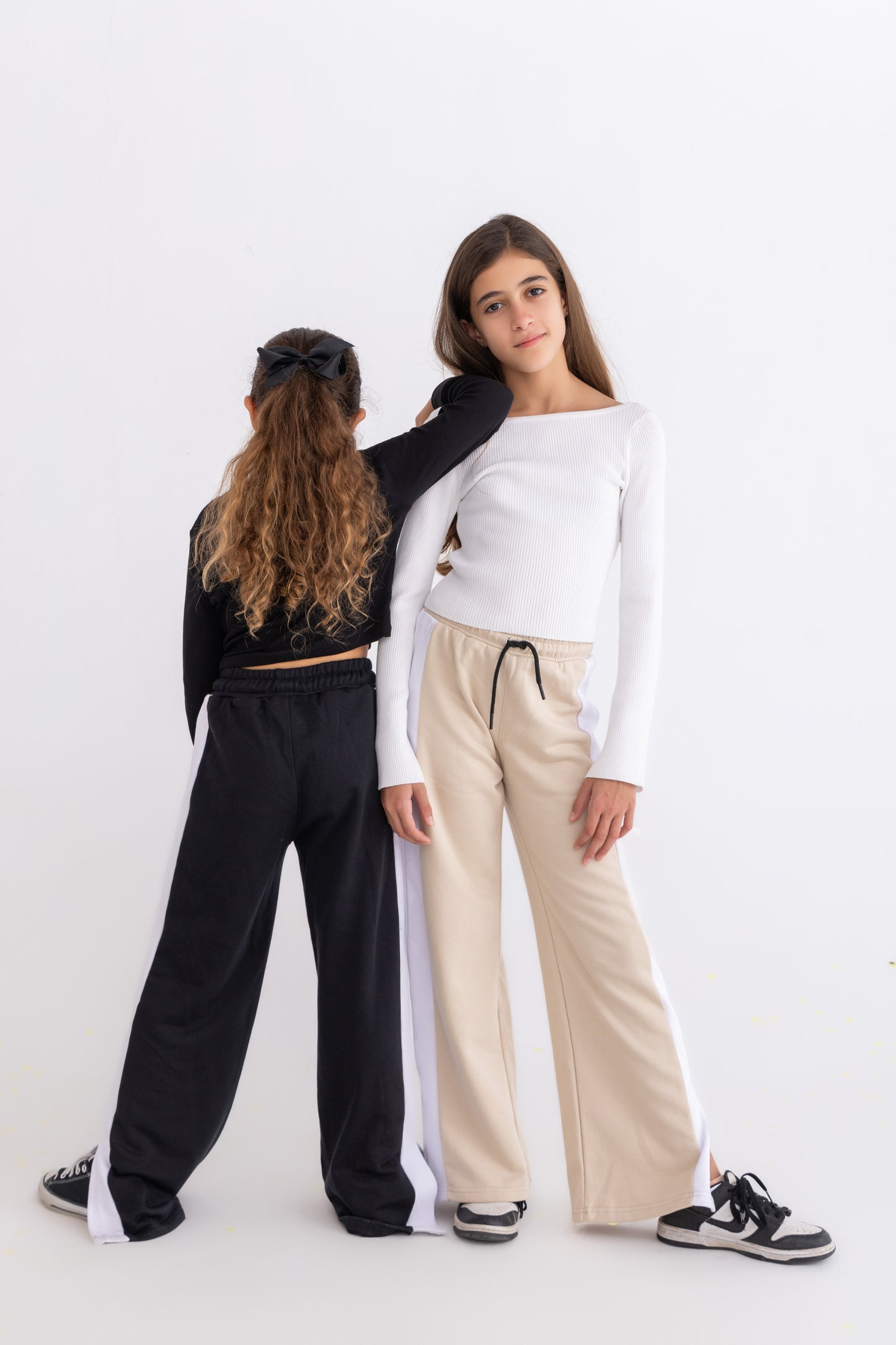 Black plush trousers with side bands