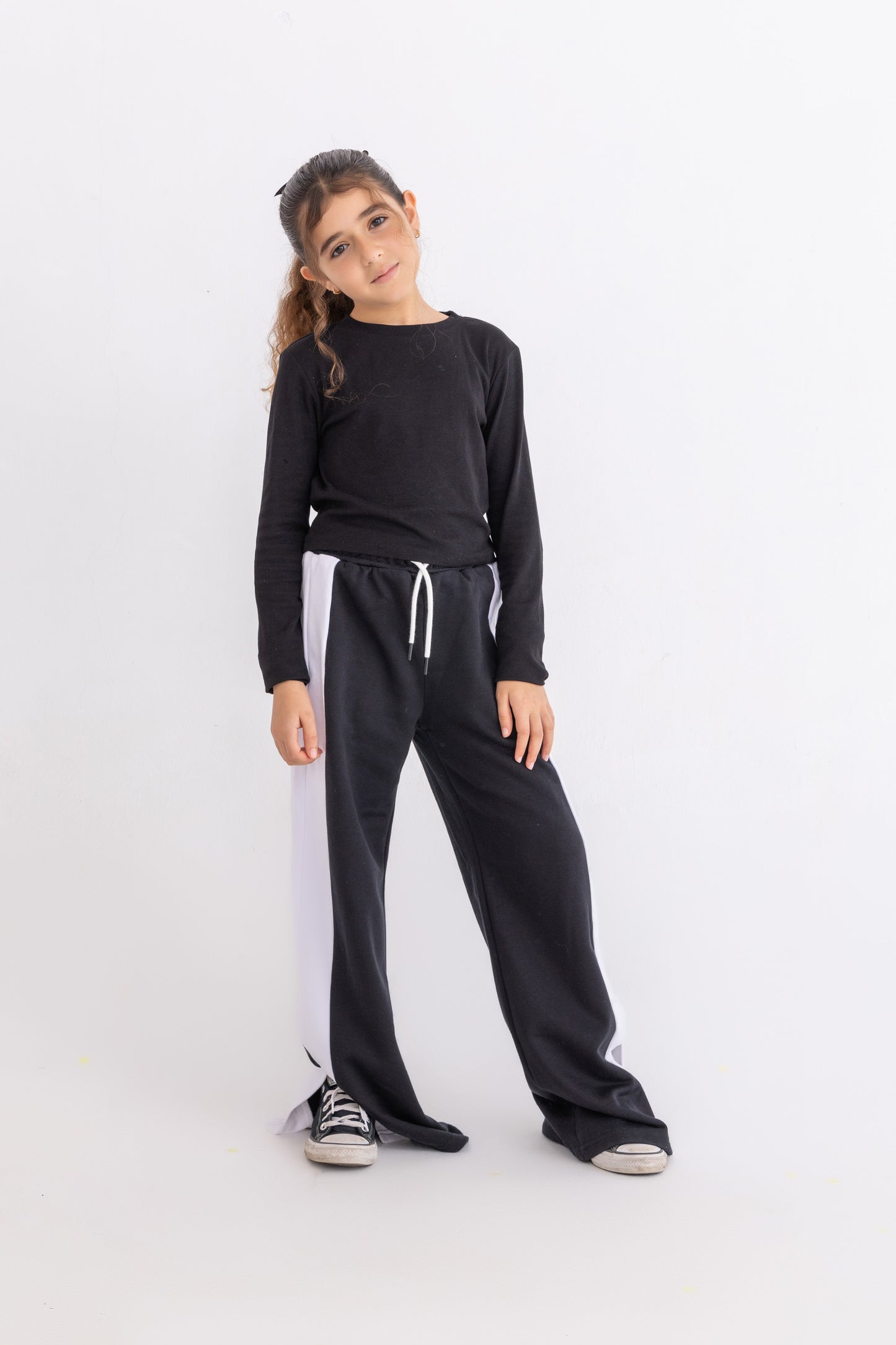 Black plush trousers with side bands