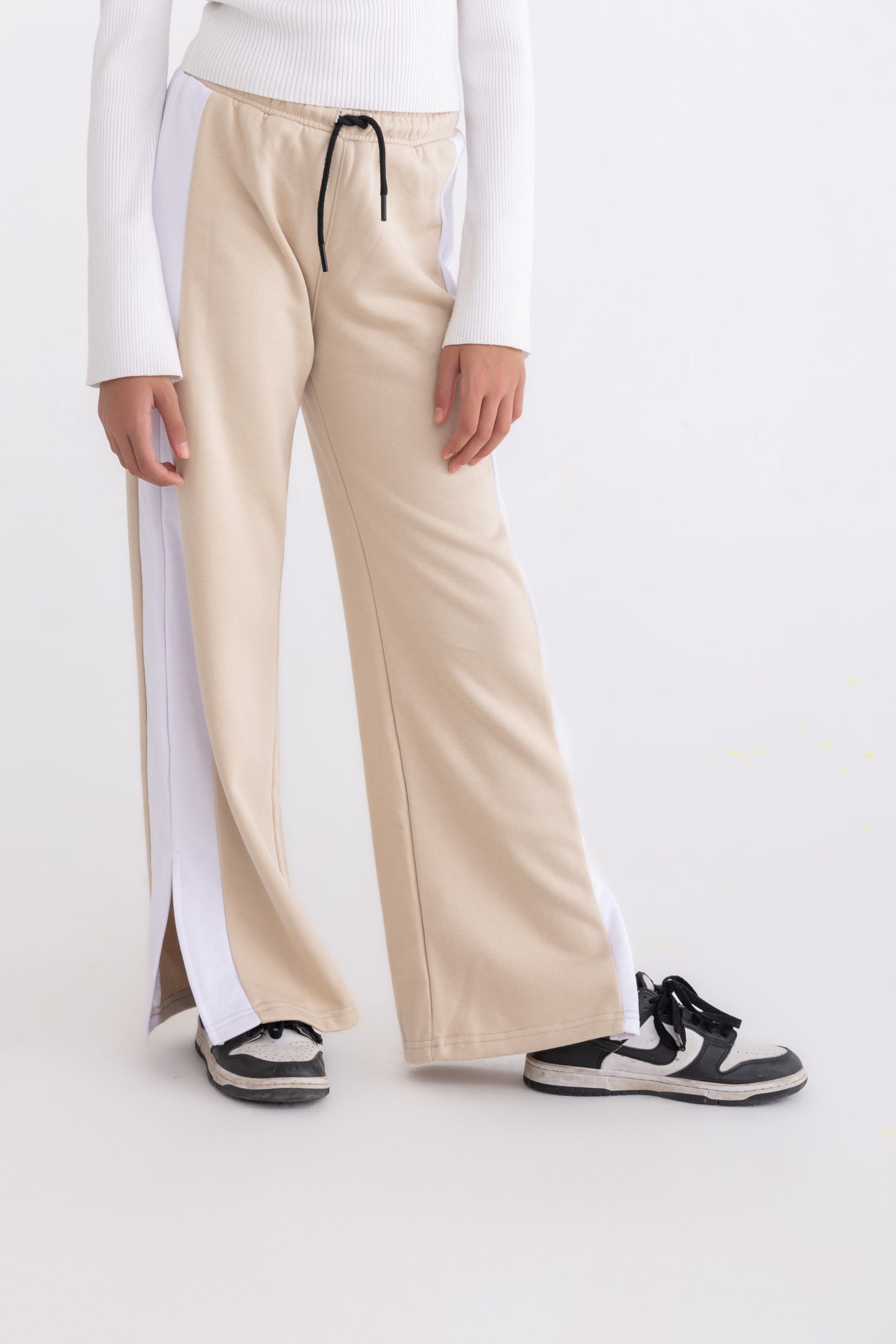 Beige plush trousers with side bands