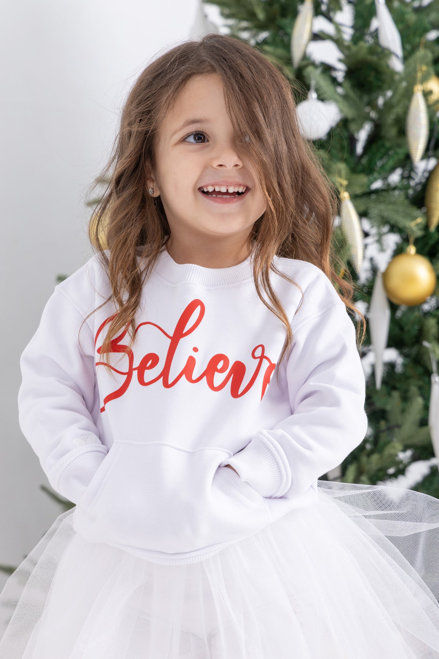 “Believe” white sweatshirt