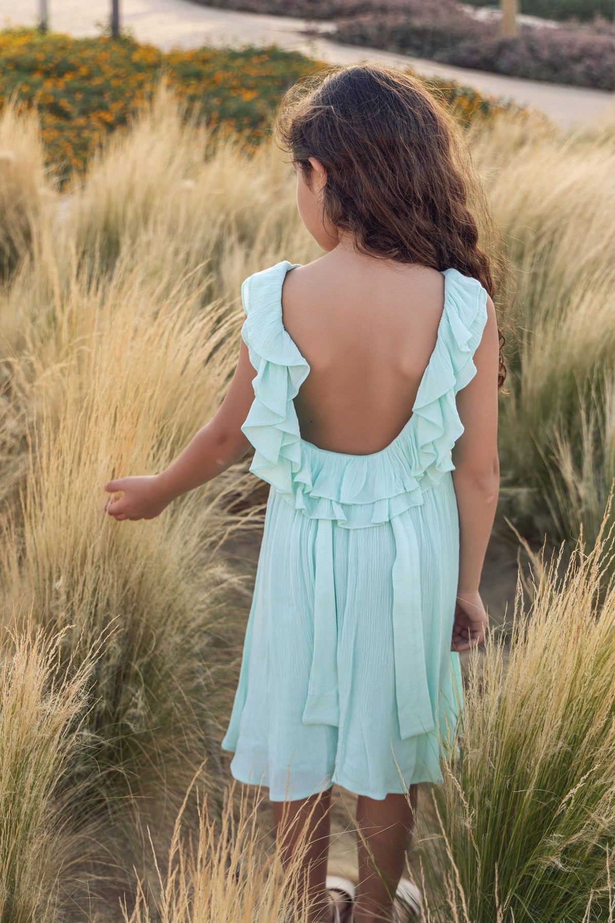 Mint ruffle backless dress in textured fabric