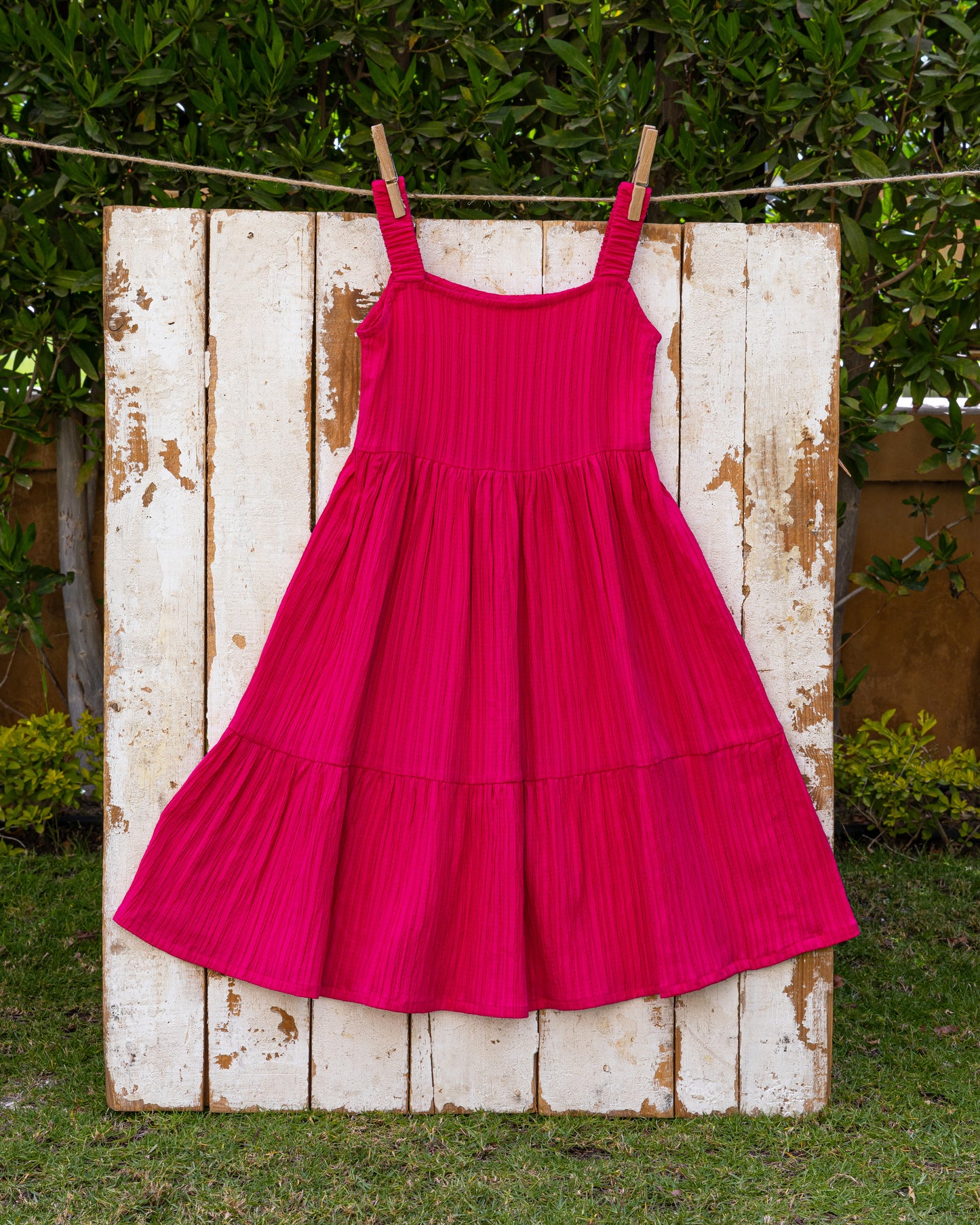Bright pink textured twirl dress
