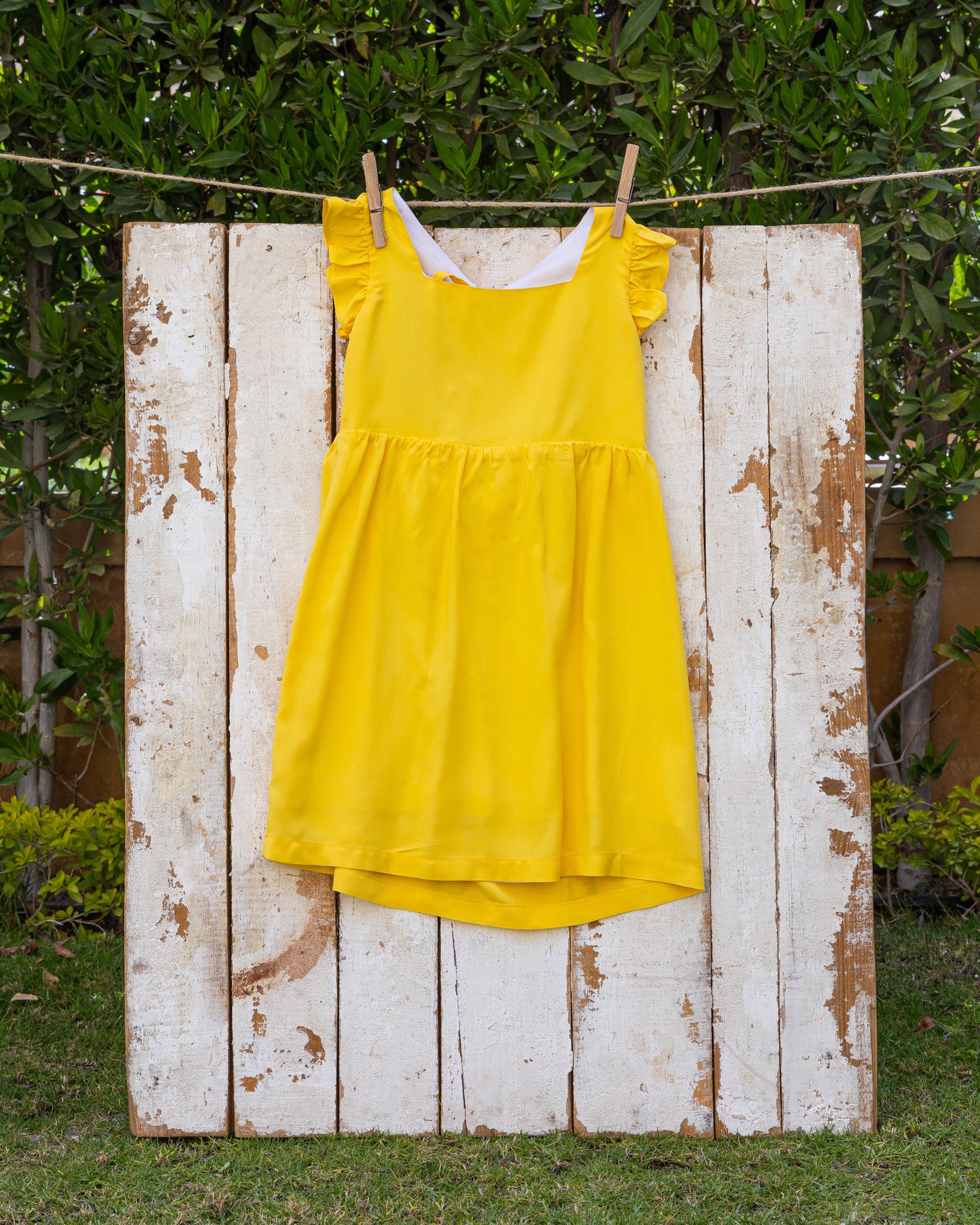 Tie-back dress in sunshine yellow cotton