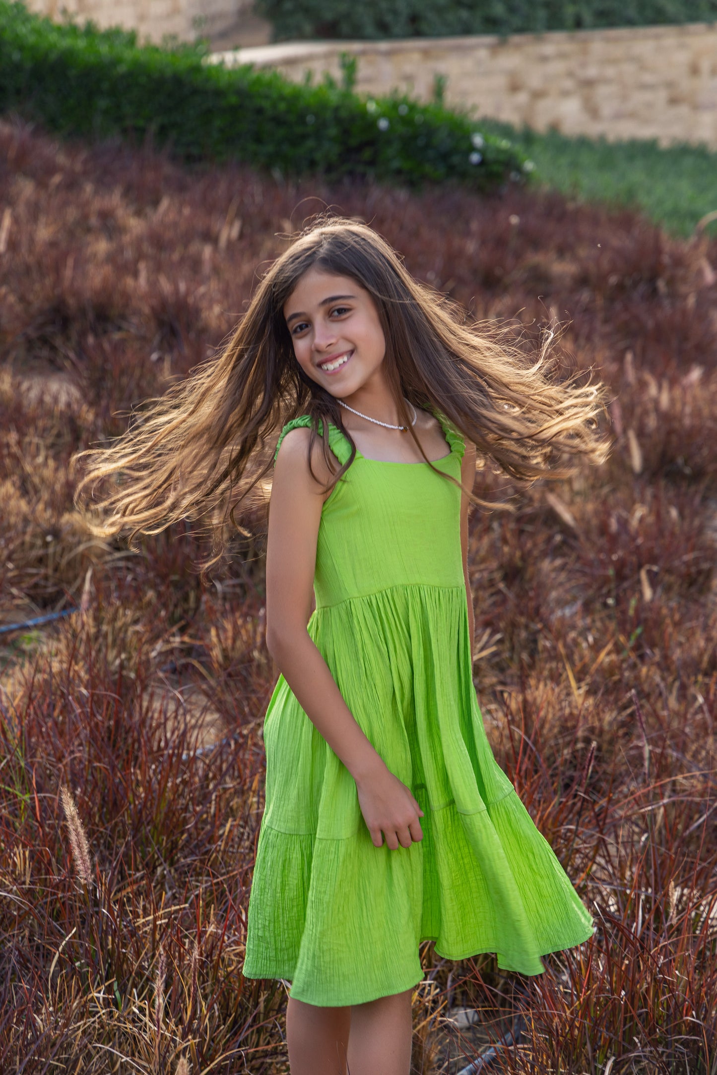 Bright green textured twirl dress