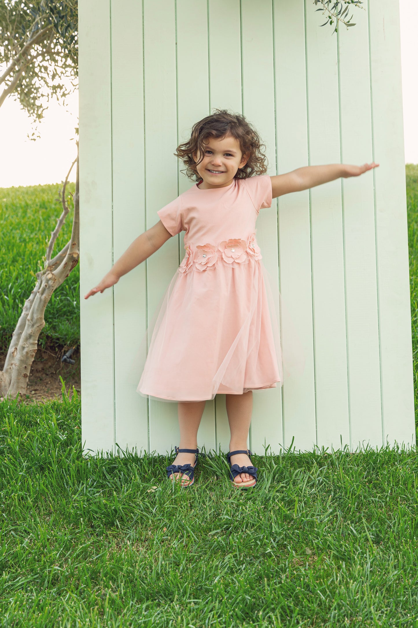 Star of the party tull dress with handmade flowers