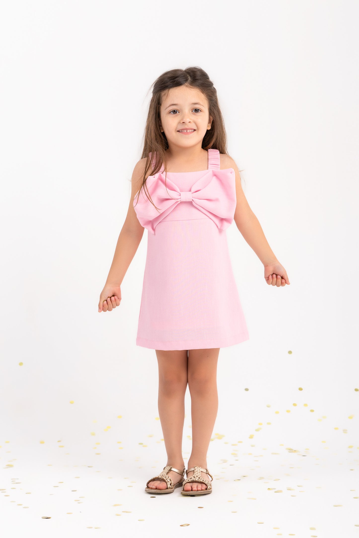 Bow dress in baby pink