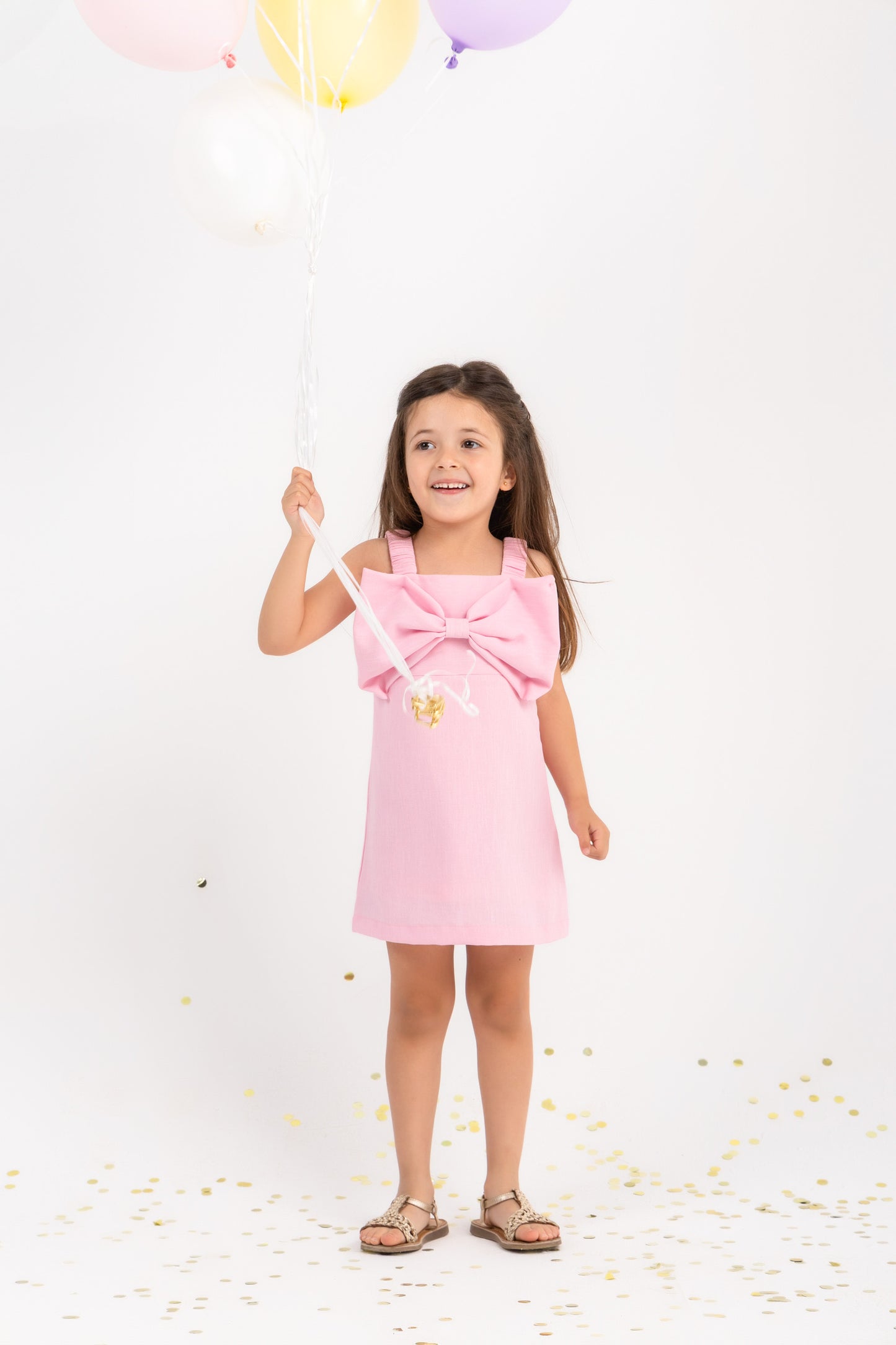 Bow dress in baby pink