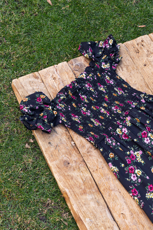 Floral smocked dress in black